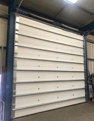 ผู้ส่งออกประตูม้วนกันไฟแบบแบ่งส่วนสำหรับโรงงานอุตสาหกรรมสถานีดับเพลิงพร้อมระบบล็อคความปลอดภัยสูง พร้อมระบบขึ้นรูปอัตโนมัติและระบบปลดฉุกเฉิน