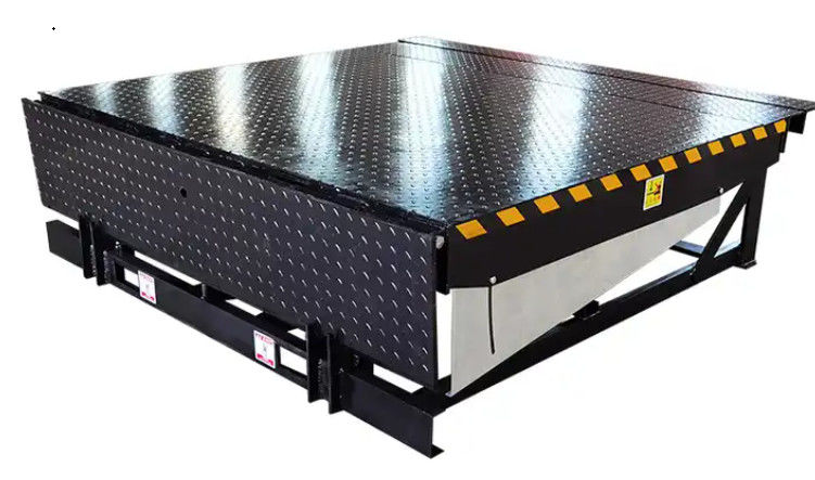 ปรับแต่งความสูงของตึกไฟฟ้า Dock Door Levelers Workshop อัตโนมัติ Dock Plate 25000-40000LBS การออกแบบที่ปลอดภัย